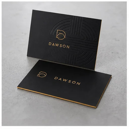 Close-up of a business card with a restrained foil finish and clear typography