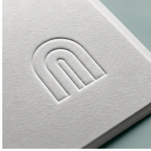 Embossed brand mark demonstrating logo reproduction as a physical finish