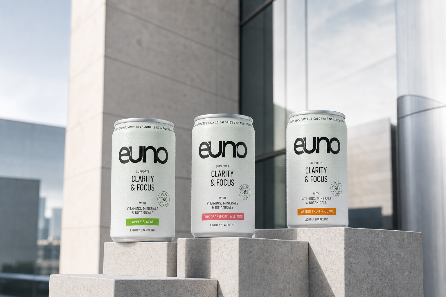 Euno Apple and Acai, Pink Grapefruit and Lemon, and Passion Fruit and Guava functional drink cans in a premium Central London campaign setting