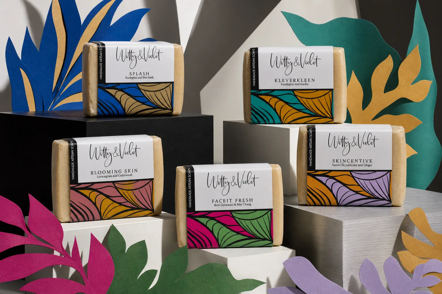 Front-facing Witty and Violet artisan soap packaging range